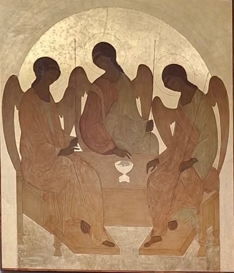3 angels at a table